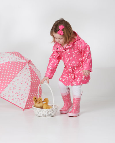 little girl photo raincoat and ducklings