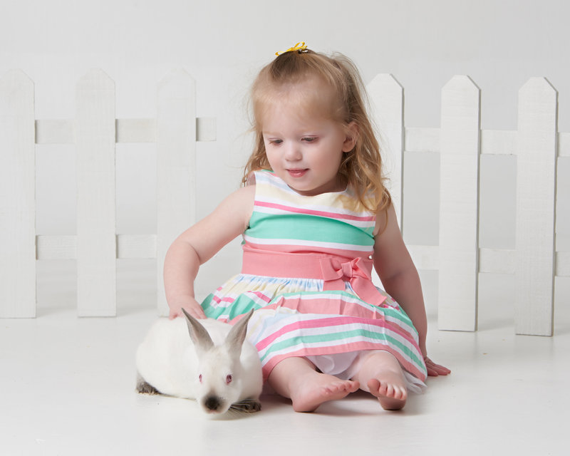 little girl with baby bunny easter photo